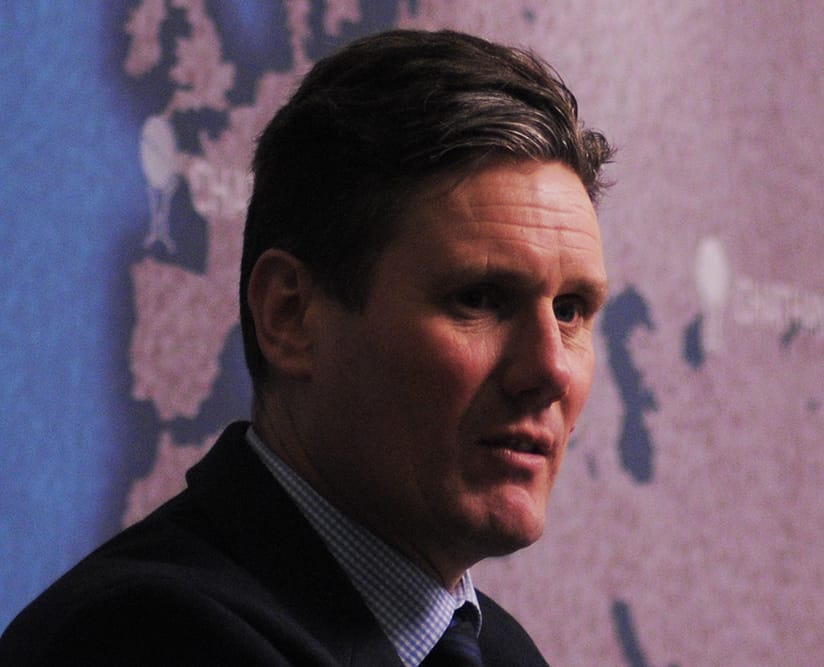 The face of Sir Keir Starmer, partially in shadow.
